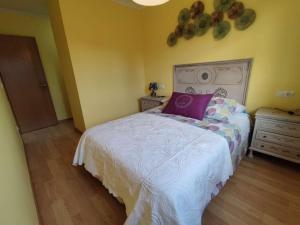 Ένα ή περισσότερα κρεβάτια σε δωμάτιο στο Barreiros Viladaide