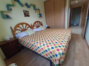 Ένα ή περισσότερα κρεβάτια σε δωμάτιο στο Barreiros Viladaide