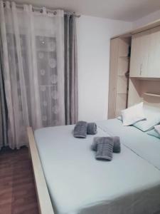 Postel nebo postele na pokoji v ubytování Alnea