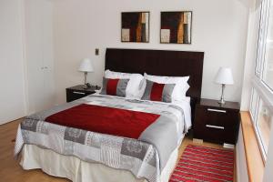 Krevet ili kreveti u jedinici u okviru objekta Concepción Suites
