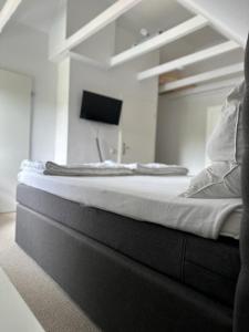 Postel nebo postele na pokoji v ubytování Kuestenbude Ahoi