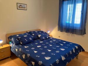 Postel nebo postele na pokoji v ubytování Apartment Kata