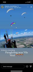 a screenshot of a website with a person on a parachute at Vila Vera Vrsac in Vršac