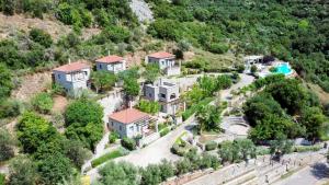 an aerial view of a house on a mountain at Ryalos Villas in Kalamata