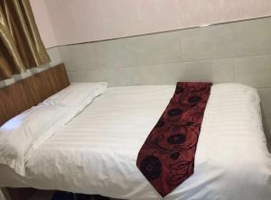 Letto o letti in una camera di 泰豪賓館