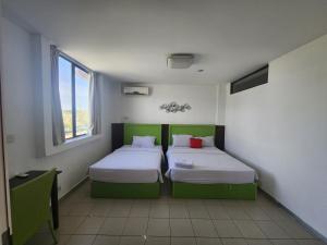 Postel nebo postele na pokoji v ubytování Y Hotel + 17 fotografií