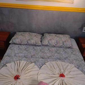 Cama o camas de una habitación en Casa1 Sua casa de férias perto das praias