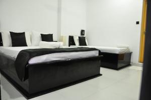Letto o letti in una camera di Villa Hotel