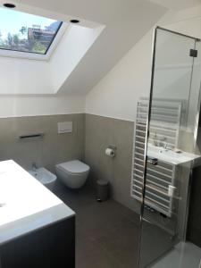Kúpeľňa v ubytovaní Appartements Pedescin