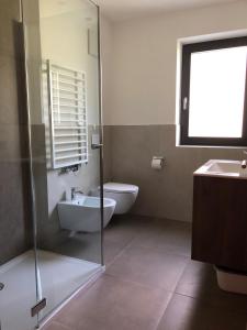 Kúpeľňa v ubytovaní Appartements Pedescin