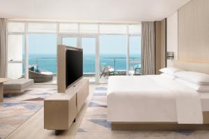 TV a/nebo společenská místnost v ubytování Sheraton Beihai Resort