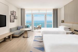 TV a/nebo společenská místnost v ubytování Sheraton Beihai Resort