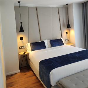 Taverna de la Sal Boutique Hotel客房内的一张或多张床位