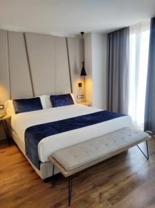Taverna de la Sal Boutique Hotel客房内的一张或多张床位