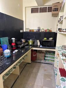 Nhà bếp/bếp nhỏ tại JMJ Residency