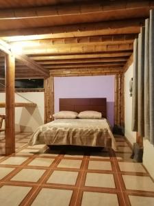 Postel nebo postele na pokoji v ubytování Casa el edén