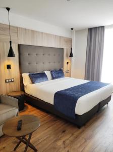 Posteľ alebo postele v izbe v ubytovaní Taverna de la Sal Boutique Hotel