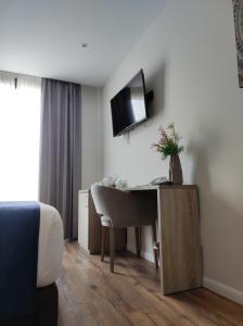 Taverna de la Sal Boutique Hotel的电视和/或娱乐中心