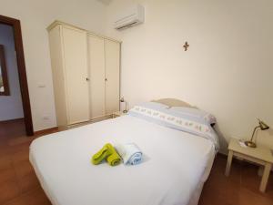 Postel nebo postele na pokoji v ubytování Casa Vacanze "Dimora Quercia" - Villino "Quercia"