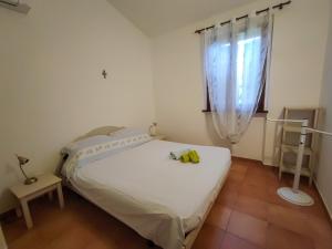Postel nebo postele na pokoji v ubytování Casa Vacanze "Dimora Quercia" - Villino "Quercia"