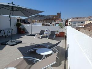 Taverna de la Sal Boutique Hotel的阳台或露台