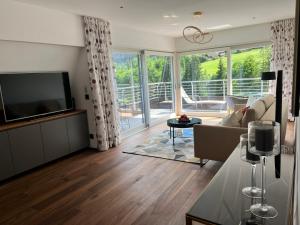 A television and/or entertainment centre at Hotel Hollweger