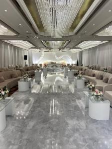 a rendering of a lobby with couches and tables at Braira Al Olaya in Riyadh +62 photos