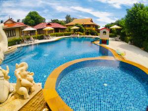 Bazén v ubytování PS Thana Resort nebo v jeho okolí