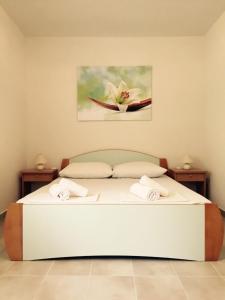 Un pat sau paturi într-o cameră la Rooms Florida