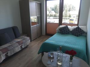 Postel nebo postele na pokoji v ubytování Pokoje Gościnne "ZBYNIO"