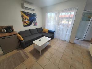 Posezení v ubytování Apartment Olive Garden with Private Pool