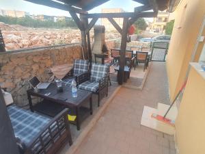 Posezení v ubytování Apartment Olive Garden with Private Pool