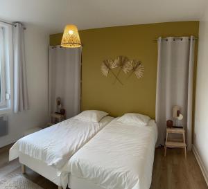 Posteľ alebo postele v izbe v ubytovaní Le tanneur