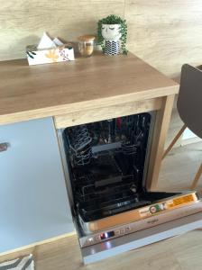 an oven in the middle of a table at Apartmán B3 Hrabušice in Hrabušice