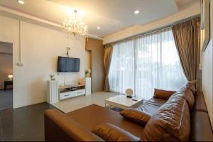 TV a/nebo společenská místnost v ubytování Hideout Nimman, Privacy Villa