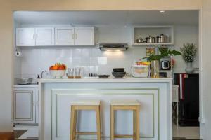 Una cocina o cocineta en Hideout Nimman, Privacy Villa