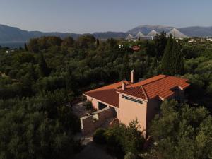 an aerial view of a house with a roof at Kastelokampos Art House in Patra