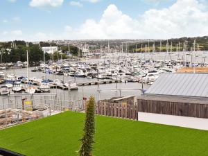a view of a marina with boats in the water at Puffling in Falmouth