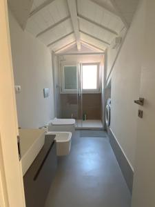 A bathroom at Diano Design&Suite Azur