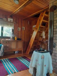 Posezení v ubytování Kremna Cottage