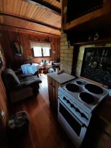 Posezení v ubytování Kremna Cottage