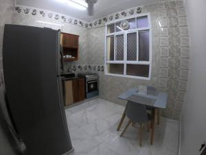 Kuchyň nebo kuchyňský kout v ubytování chalet IN