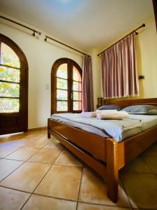 Postel nebo postele na pokoji v ubytování Platamon village house