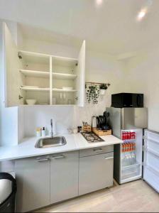 Kuchyň nebo kuchyňský kout v ubytování Sublime appartement Calme Cosy & Jacuzzi + 19 fotografií
