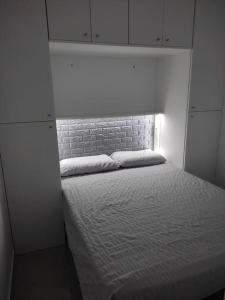 Una cama o camas en una habitación de Apartamento entero
