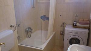 Koupelna v ubytování Nena City Center Apartment + 30 fotografií
