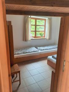 Postel nebo postele na pokoji v ubytování Velký apartmán Cihlarka