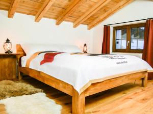 Postel nebo postele na pokoji v ubytování stettli resort