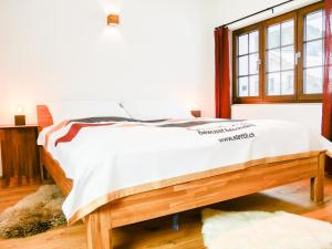 Postel nebo postele na pokoji v ubytování stettli resort