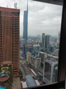 a view from a window of a city with buildings at Holiday at Times Square KL in Kuala Lumpur